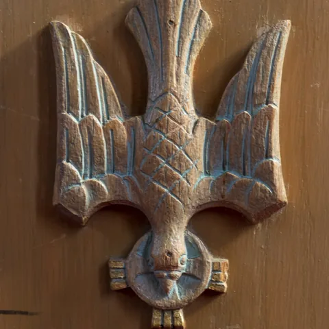 Carved wooden dove detail