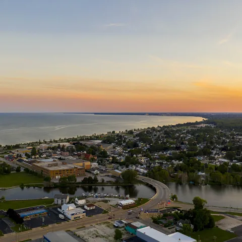 Aerial view over the waterfront and town at sunset