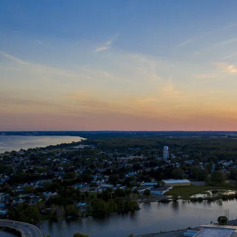Aerial view across the town and waterways at dusk