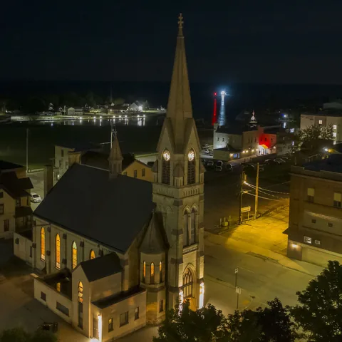 Church and surrounding streets illuminated at night